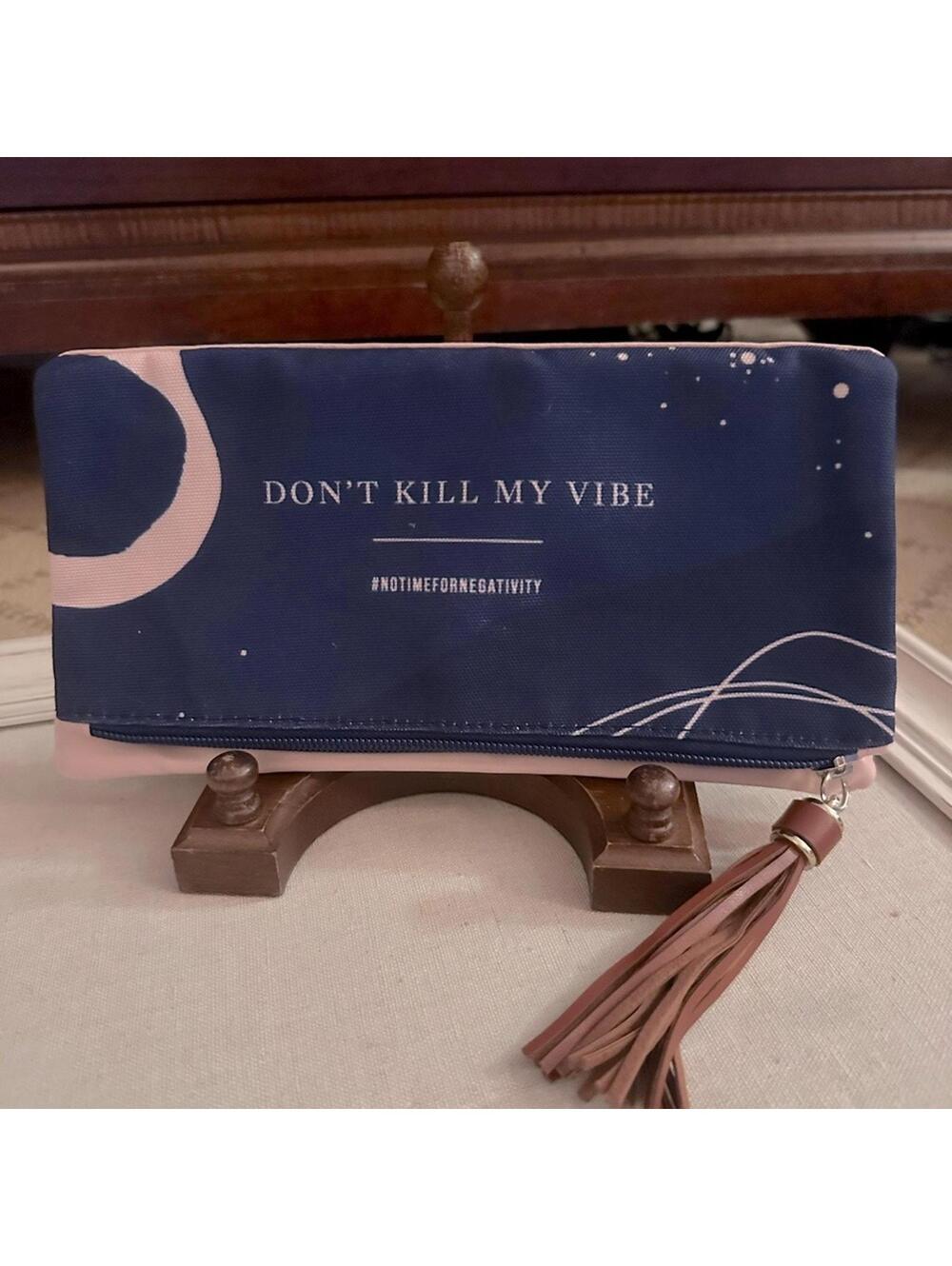 Blue and pink fold over zipper clutch “Don’t Kill My Vibes”. NWOT